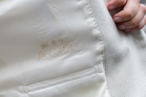 Borduring dames trouwpak persoonlijke tekst