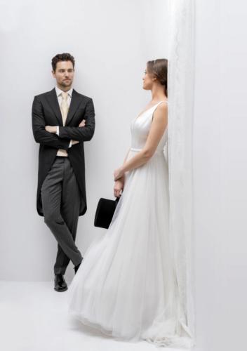 Traditioneel Jacquet op maat gemaakt met gouden gilet en streep broek