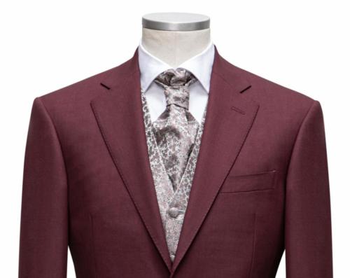 Uniek trouwpak op maat gemaakt van rode zacht glanzende wol met roze zijde gilet